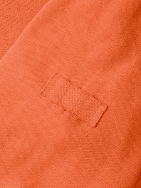Orange (elastischer Stifthalter am Oberarm) Foto: RUSSELL-EUROPE